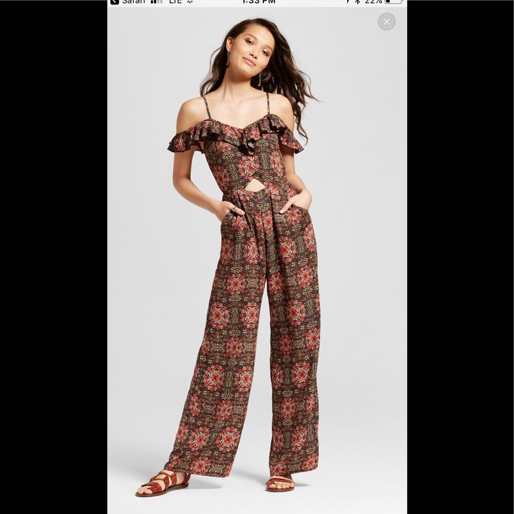 Super cute jumpsuit! Only worn once!